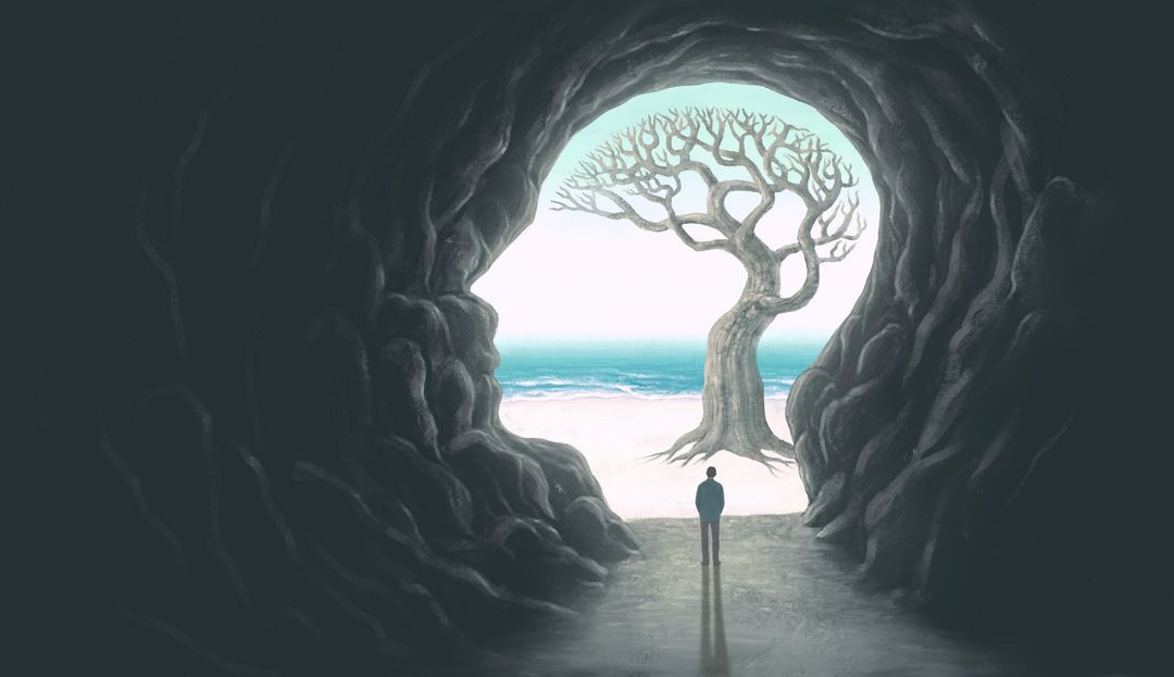 Abstrakte Darstellung einer wie ein menschlicher Kopf geformten Höhle mit Baum in Form eines Gehirns